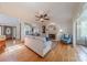 Bright living room featuring a fireplace, hardwood floors, and ample natural light at 6024 Highview Rd, Weddington, NC 28104