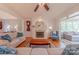 Inviting living room with hardwood floors, fireplace, and neutral décor, perfect for relaxing and entertaining at 6024 Highview Rd, Weddington, NC 28104
