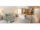 Bright and airy living room open to the kitchen, with a comfortable sofa and natural light at 6310 Highland Commons Rd, Charlotte, NC 28269