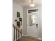 Bright entryway with a modern front door featuring a window and decorative plants, enhancing curb appeal at 7108 Hodges Meadow Ln, Charlotte, NC 28213
