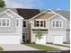 Charming townhome featuring a one-car garage, neutral siding, and a well-manicured lawn at 7108 Hodges Meadow Ln, Charlotte, NC 28213