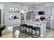 Open concept kitchen featuring granite countertops, stainless steel appliances, and a spacious island at 7108 Hodges Meadow Ln, Charlotte, NC 28213