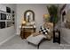 Cozy sitting room features a plush chaise lounge, stylish decor, and ample natural light, perfect for relaxation at 7108 Hodges Meadow Ln, Charlotte, NC 28213
