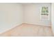 Bedroom with carpet flooring and a bright window at 7205 Finnigan Rd, Charlotte, NC 28215