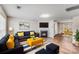 Comfortable living room with a cozy fireplace and stylish contemporary furnishings at 7205 Finnigan Rd, Charlotte, NC 28215