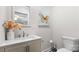 Elegant half bathroom with modern fixtures and vanity at 7860 Henry Harris Rd, Fort Mill, SC 29707