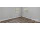 Spacious bedroom with wood flooring and natural light at 7860 Henry Harris Rd, Fort Mill, SC 29707