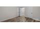 Large bedroom with wood flooring and closet space at 7860 Henry Harris Rd, Fort Mill, SC 29707