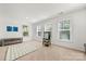 Bright living room featuring neutral carpet, large windows, and space for entertaining or relaxing at 862 Kathy Dianne Dr, Fort Mill, SC 29707