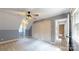 Bedroom with neutral tones, natural light, dual closets, and doorway to the bathroom at 8905 Vagabond Rd, Mint Hill, NC 28227