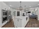Well-appointed kitchen with a large island, stainless steel appliances, and an open layout at 9625 Donna Ve Ln, Charlotte, NC 28277