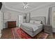 Serene primary bedroom with a plush bed, soft lighting, and elegant decor at 9625 Donna Ve Ln, Charlotte, NC 28277