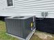 Close up of the air conditioning unit in the lawn at 103 Meadow Ne Ave # 6, Concord, NC 28025