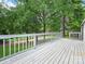 Open deck with natural views overlooking the backyard at 10379 Turnplow Dr, Davidson, NC 28036