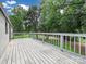 Open deck with natural views overlooking the backyard at 10379 Turnplow Dr, Davidson, NC 28036
