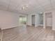 Open basement includes access to the backyard, stairs and another room at 1040 Spring Dr, Gastonia, NC 28052