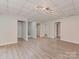 Large basement area leads to the stairs and other rooms at 1040 Spring Dr, Gastonia, NC 28052