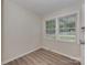 A well-lit room boasts new plank flooring and ample natural light at 1040 Spring Dr, Gastonia, NC 28052