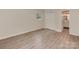 Well-lit bedroom with vinyl floors, single window and a closet for storage and organization at 1040 Spring Dr, Gastonia, NC 28052