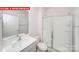 Bathroom features single sink vanity, tile floors, and a glass enclosed shower at 11132 Cardinal Creek Ave, Charlotte, NC 28215