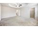 Large main bedroom with neutral paint and flooring, leading to the walk-in closet at 12009 Elizabeth Madison Ct, Charlotte, NC 28277
