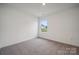 Bright bedroom featuring neutral carpet, natural light and a cozy feel at 1228 Hallman Branch Ln, Lincolnton, NC 28092