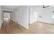 Spacious bedroom with hardwood floors, white walls, and ample natural light at 13618 Tranquil Day Dr, Matthews, NC 28105
