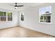 Bedroom featuring wood floors, recessed lighting, ceiling fan, and views of the backyard at 13618 Tranquil Day Dr, Matthews, NC 28105