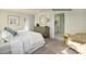 Inviting bedroom with large bed, dresser and adjacent bathroom entrance at 1415 5Th Street Ne Dr, Hickory, NC 28601