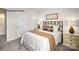 Cozy bedroom with neutral decor, soft carpet, and stylish lamps for a relaxing atmosphere at 1415 5Th Street Ne Dr, Hickory, NC 28601
