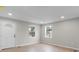 Bedroom with modern flooring and ample natural light from two windows at 1440 10Th Sw Ave, Hickory, NC 28602