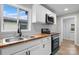 Bright kitchen featuring stainless steel appliances, wood countertops, and a double sink at 1440 10Th Sw Ave, Hickory, NC 28602