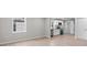 Open living space with updated flooring and a view of the modern kitchen at 1440 10Th Sw Ave, Hickory, NC 28602