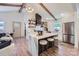 Modern kitchen featuring marble countertops, stainless steel appliances, and a large island at 1515 Edgewater Dr, Charlotte, NC 28210