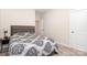 Carpeted bedroom with door to hallway at 160 Tanner Loop, Troutman, NC 28166