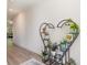 Bright hallway adorned with a stylish plant stand, smooth flooring, and fresh neutral paint at 160 Tanner Loop, Troutman, NC 28166