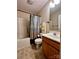 Cozy bathroom with shower and tub combination, with wood vanity cabinet at 165 Kimball Rd, China Grove, NC 28023