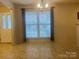 An empty dining room with a large window and lots of natural light at 165 Kimball Rd, China Grove, NC 28023
