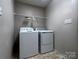The laundry room includes a standard washer and dryer at 165 Kimball Rd, China Grove, NC 28023