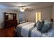 Comfortable main bedroom with ensuite bathroom, hardwood floors, and traditional decor at 165 Kimball Rd, China Grove, NC 28023