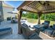 Backyard patio featuring gazebo and comfortable seating at 17228 River Race Dr, Huntersville, NC 28078