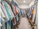 Extensive walk-in closet with organized clothing racks and shelving for shoes at 17228 River Race Dr, Huntersville, NC 28078