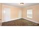 Simple bedroom with multiple closets and a window, providing a blank canvas for personalization at 175 Leonard Rd, Salisbury, NC 28146