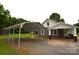 Home's covered parking featuring a brick walkway, and ample space for vehicles and storage at 175 Leonard Rd, Salisbury, NC 28146