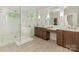 Bright bathroom with double vanity, soaking tub, and frameless glass shower at 1814 Therrell Farms Rd, Waxhaw, NC 28173