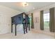 Fun bedroom featuring a unique elevated treehouse bed, natural light, and neutral walls at 1814 Therrell Farms Rd, Waxhaw, NC 28173