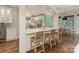 Bright kitchen features a large island with seating and stainless steel appliances, great for entertaining and Gathering gatherings at 1814 Therrell Farms Rd, Waxhaw, NC 28173