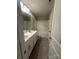 This full bathroom offers lots of counter space and a shower and tub combo at 184 Cherry Birch St, Mooresville, NC 28117