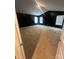 Spacious bedroom featuring neutral carpeting, dark walls, and multiple windows for natural light at 184 Cherry Birch St, Mooresville, NC 28117