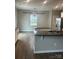 Kitchen and dining area features granite counters and stainless steel appliances at 184 Cherry Birch St, Mooresville, NC 28117